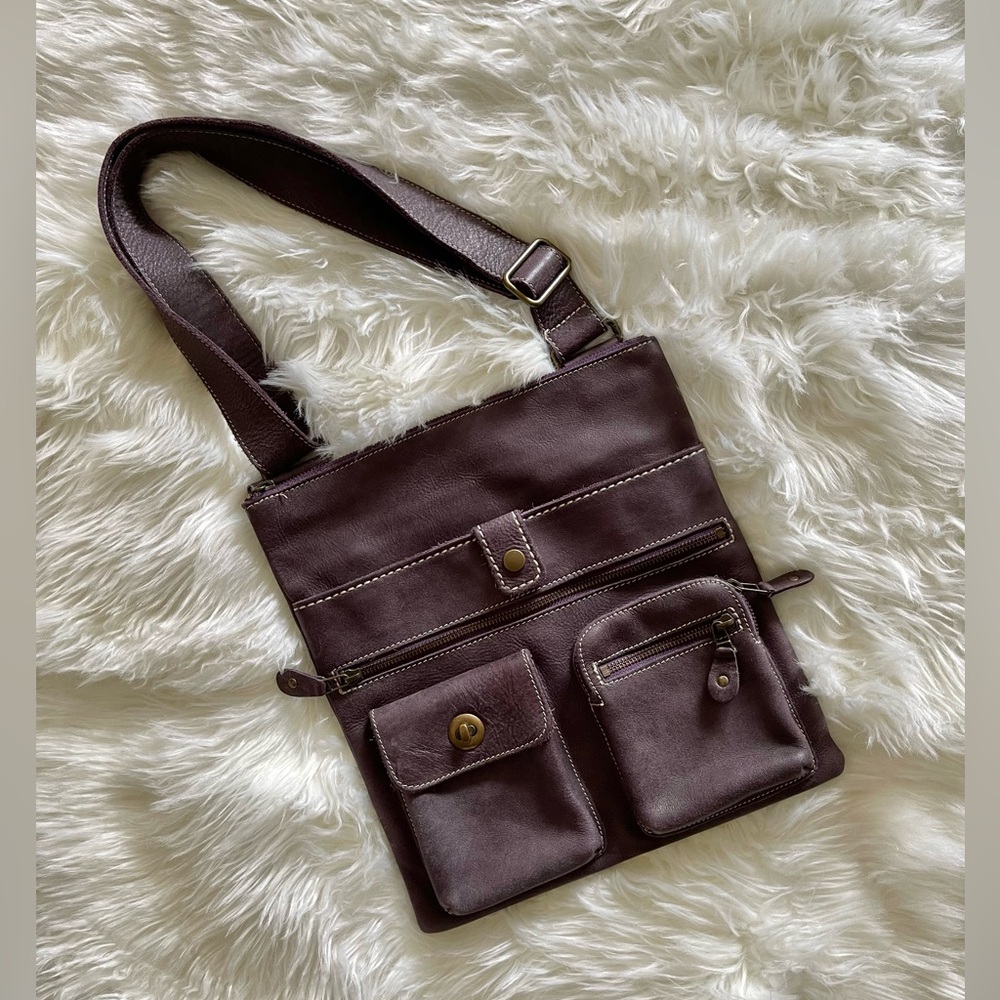 ROOTS Leather Venetian Villager Bag in Purple colour